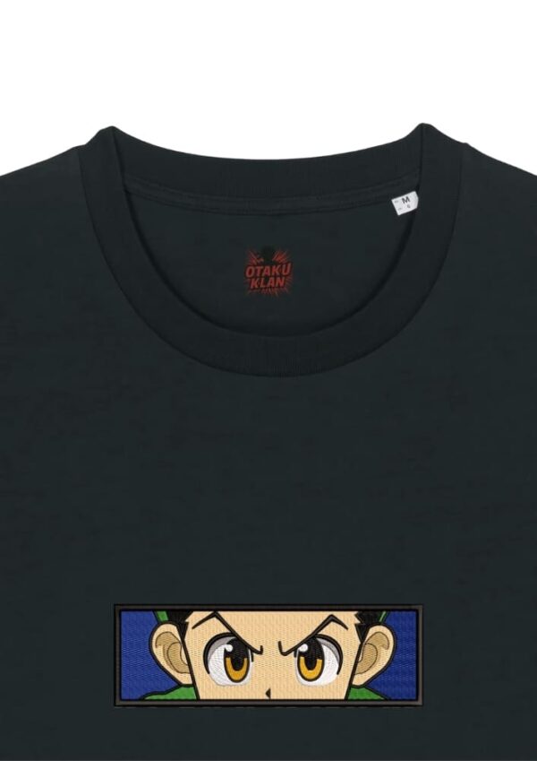 Camiseta Negra Detalle Determinación Inocente - Gon Freecss Determinación Inocente - Gon Freecss